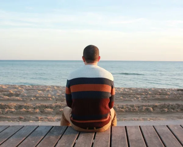Man Overlooking Water Horizon Your Story Counseling